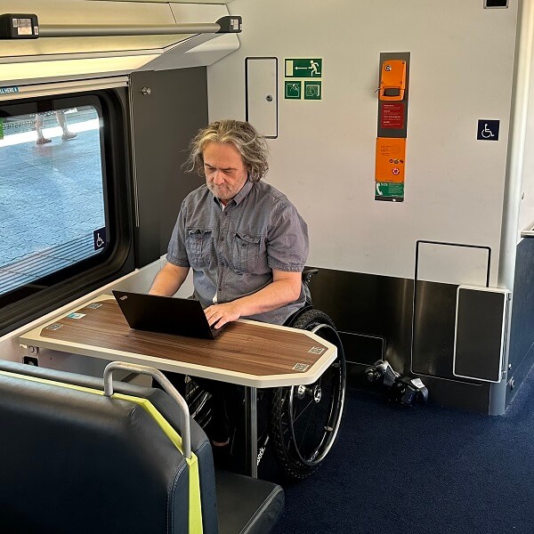 Remote work in the Westbahn at the wheelchair space